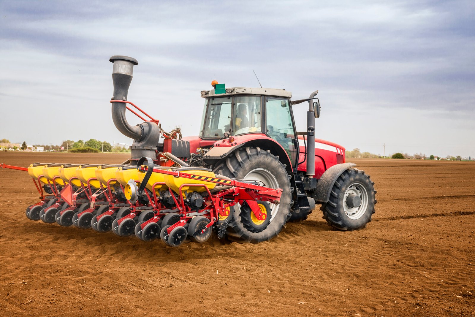 Agricultural machinery working in a field