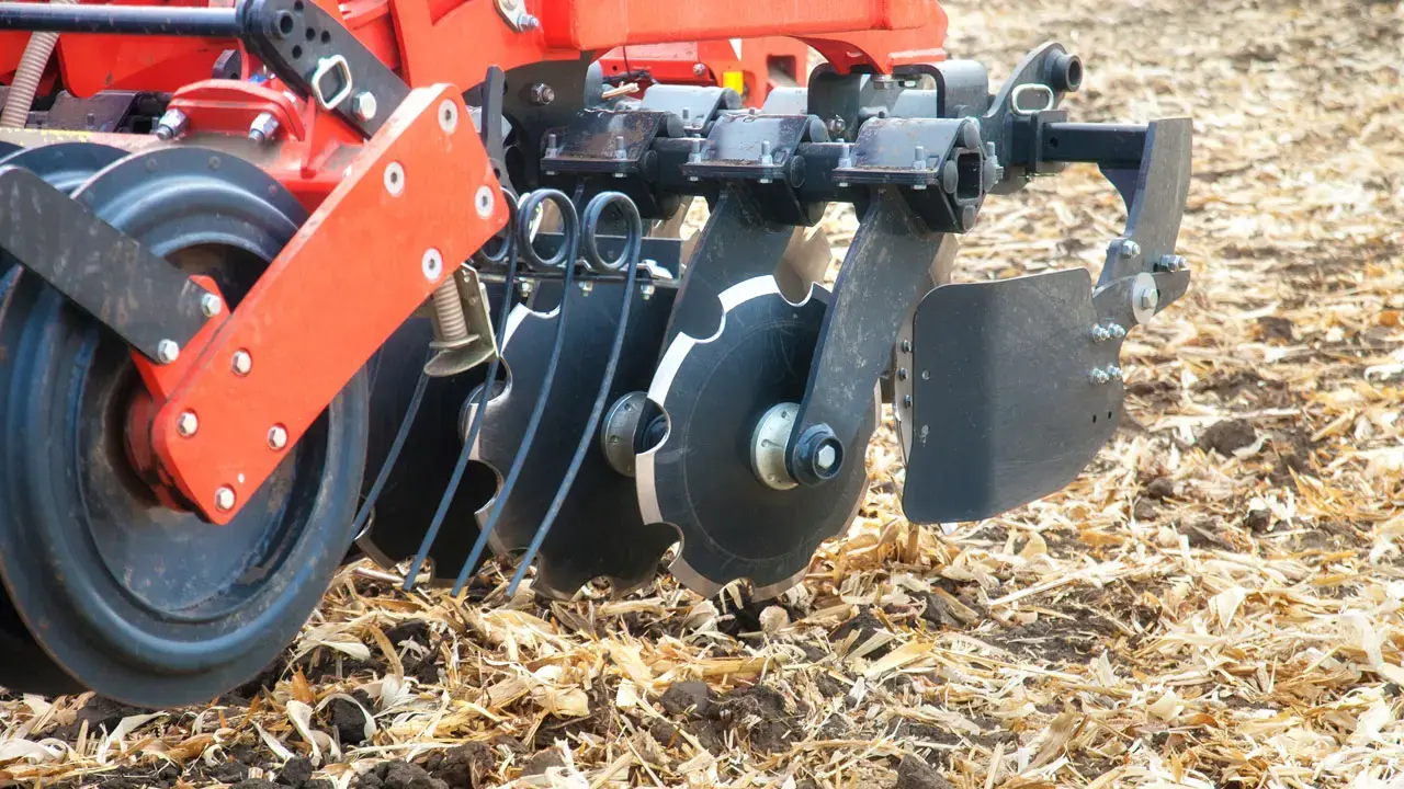 Hardened steel plough share and tillage wear part