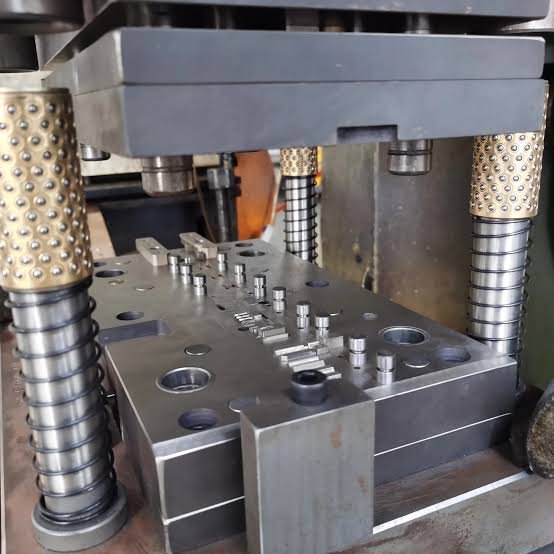 Progressive die stamping and blanking process